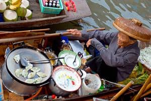 Photography composition Rule of point of view - man in boat