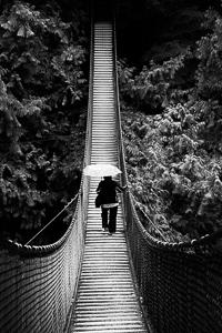 Photography composition Rule of symmetry - girl on bridge